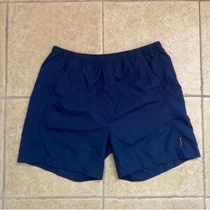Navy blue La Cordée running shorts